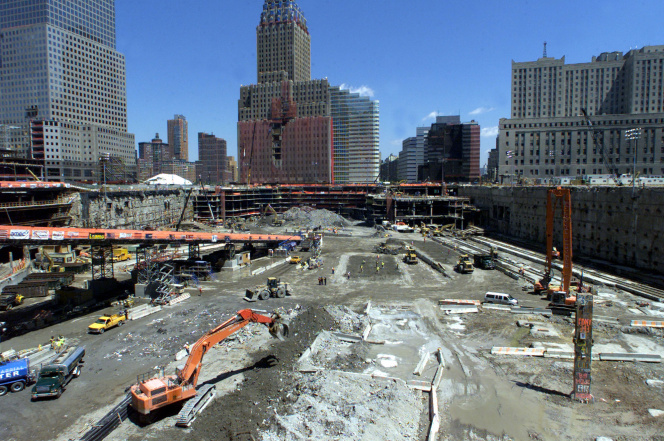 Workmen and heavy machinery operate at the Ground Zero site in May 2002. Photo: Reuters